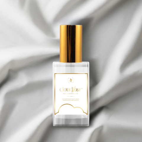 Cloud Four Parfum D'Ambiance organic room and linen spray by Four Scents by Jonae'. Features a luxurious blend of clean cotton, fresh ivory, and sandalwood notes. Made with premium fragrance oils, alcohol, and witch hazel for a non-toxic, eco-friendly scent experience that refreshes any space with elegance and tranquility